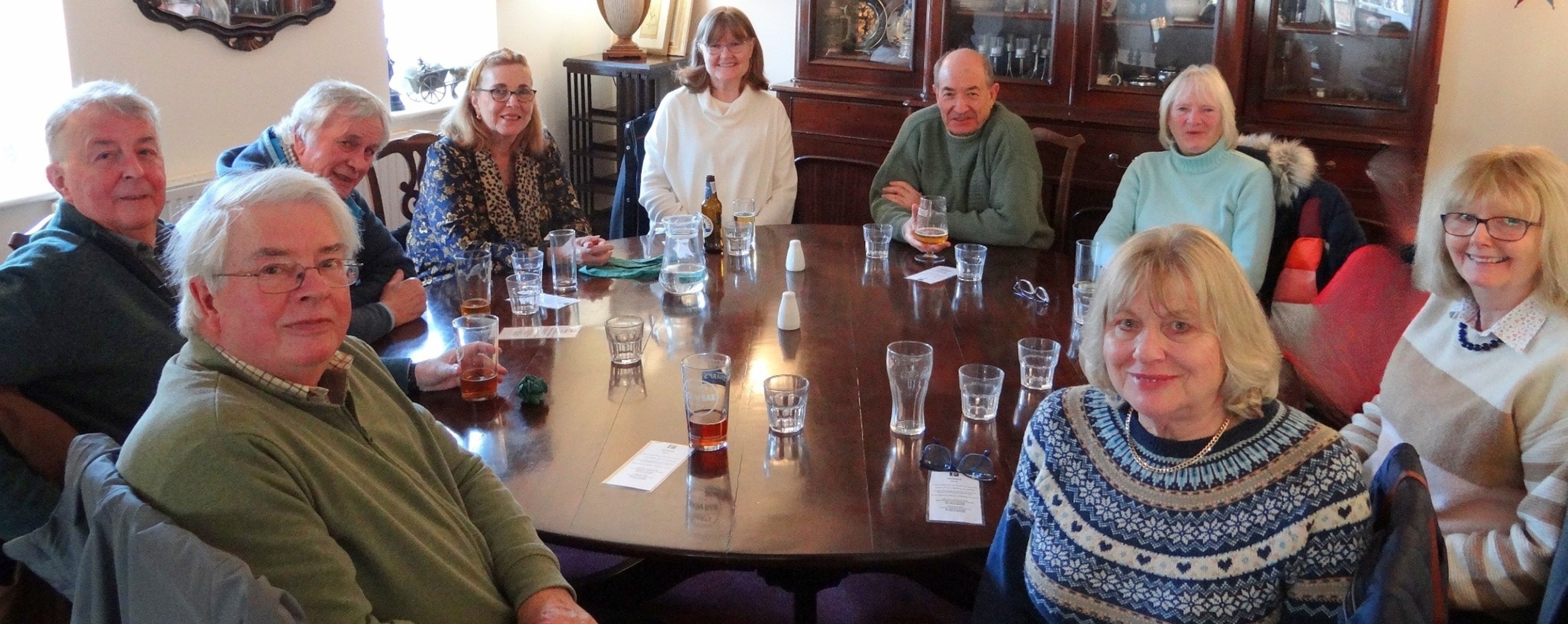 Photography group having a drink together