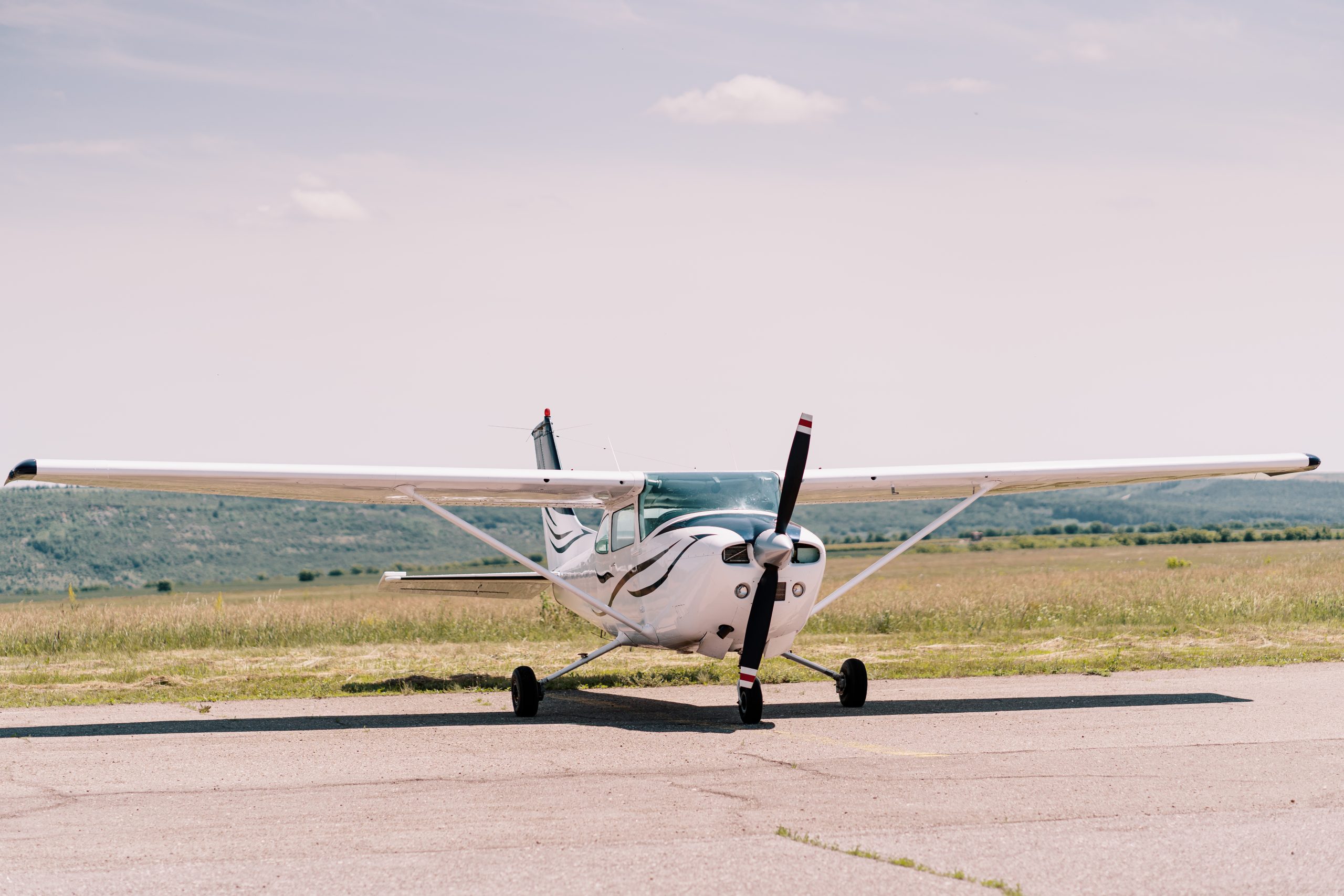 Plane on an airfield, Image by Freepik