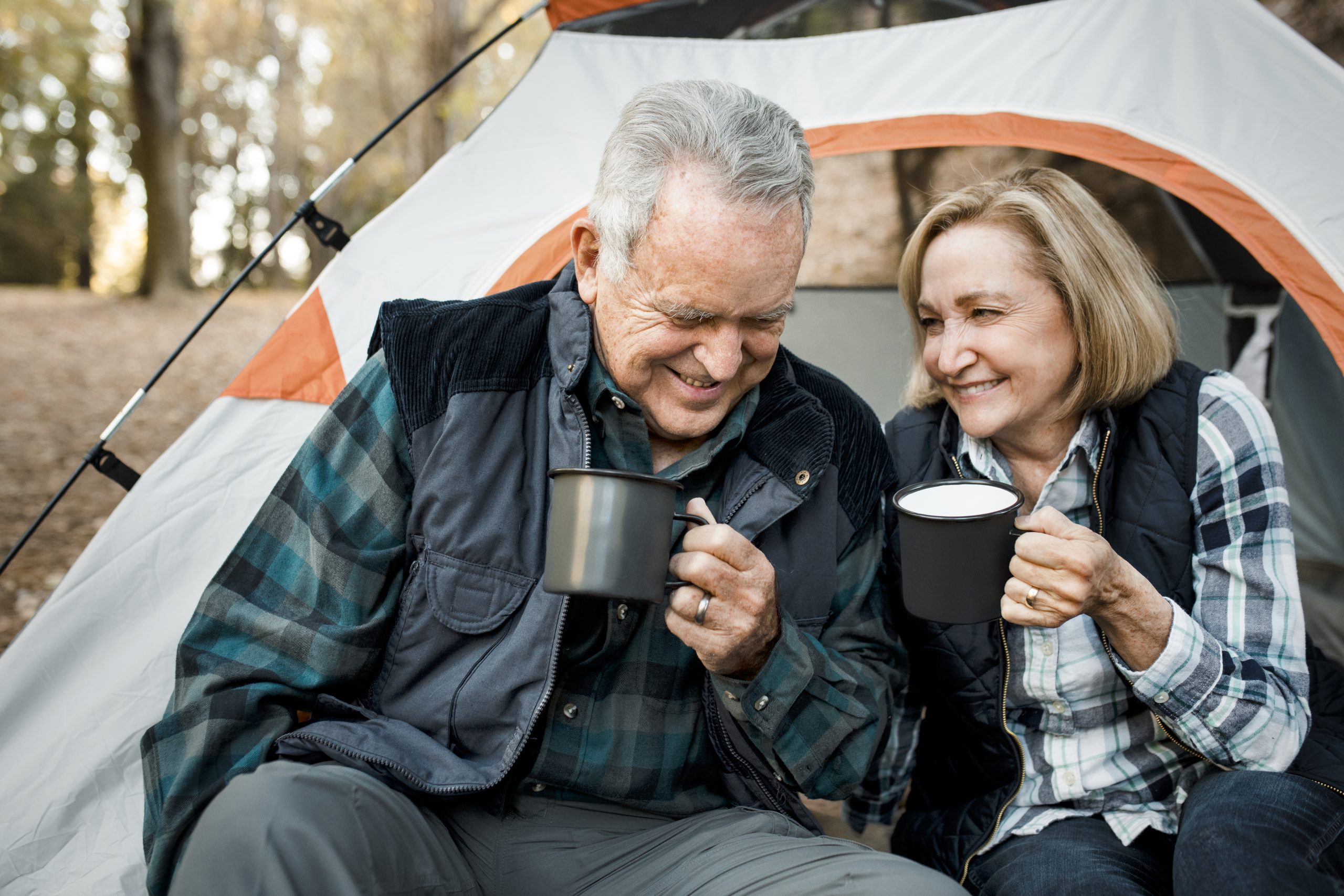 Couple having a cuppa while camping Image 13307639 by rawpixel.com on Freepik