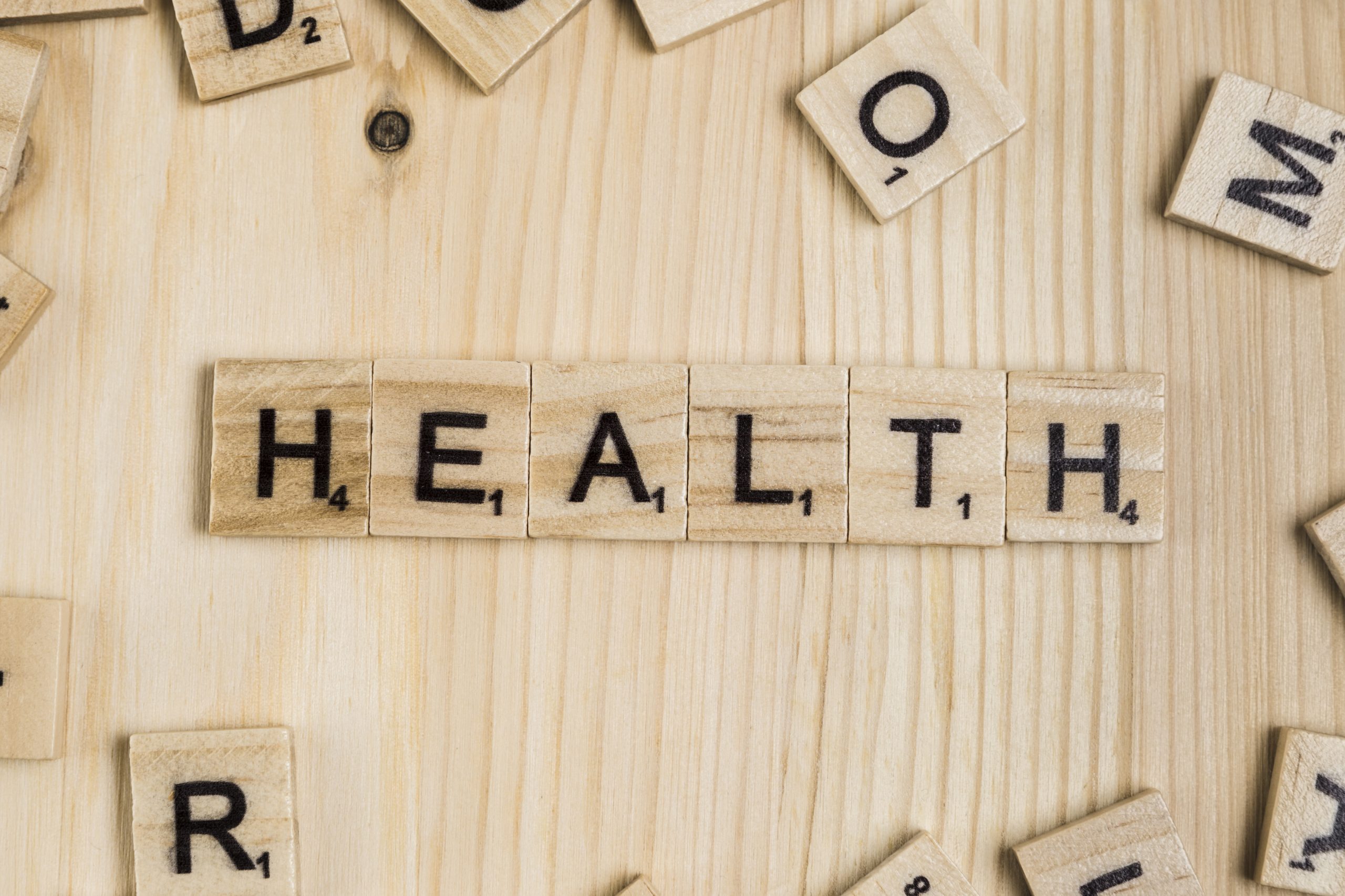 Health spelt out in tiles image 4974159 by Freepik