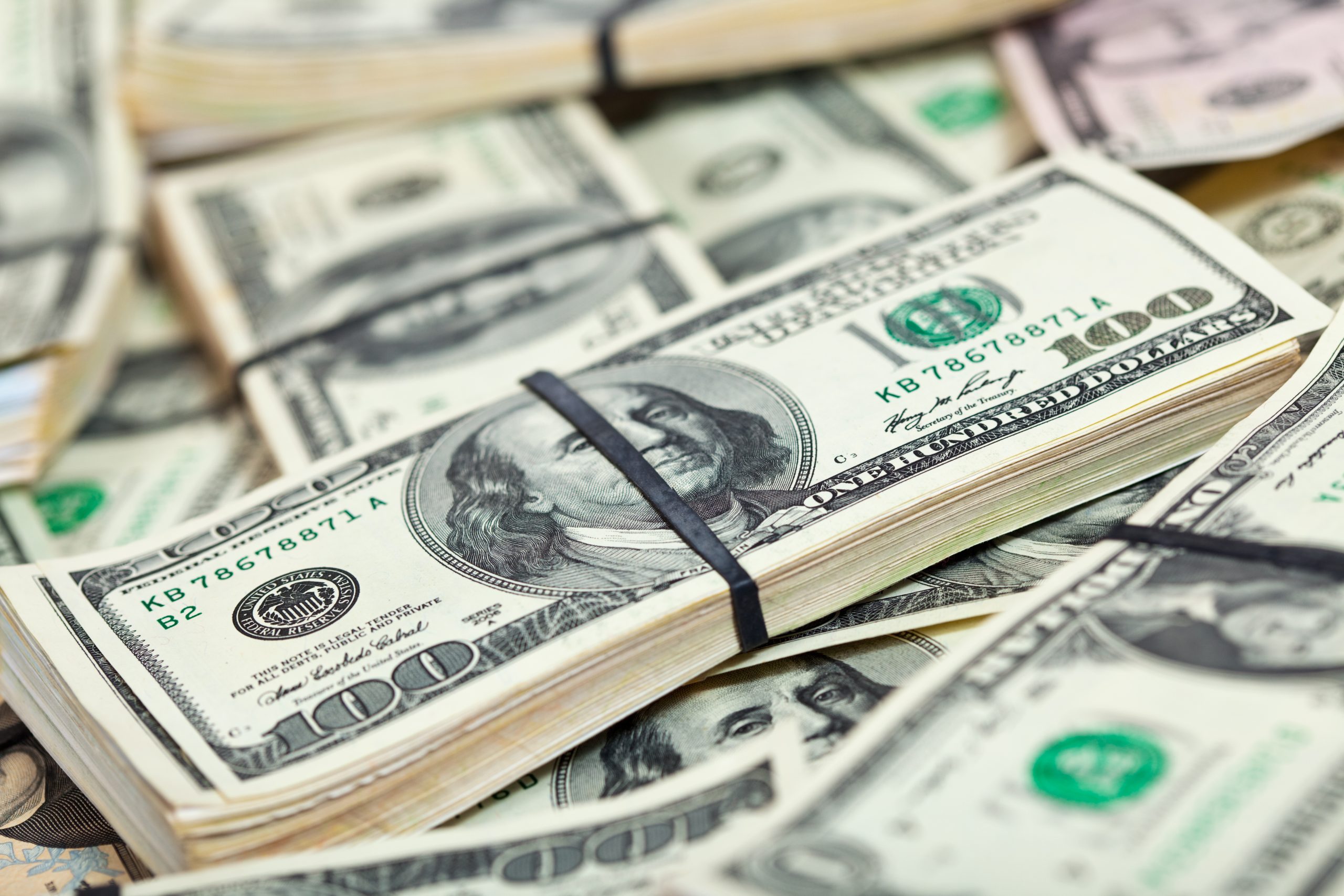 Many US Dollar banknotes Image 1474803 by bearfotos on Freepik